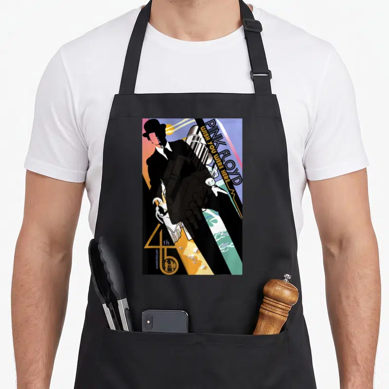 Tablier de cuisine noir avec illustration colorée d'un homme en chapeau et texte Pink Floyd J'aurais aimé que tu sois là