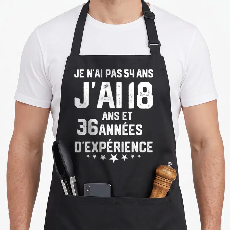 Tablier de cuisine noir avec inscription blanche Je n'ai pas 54 ans j'ai 18 ans et 36 années d'expérience sur fond uni.