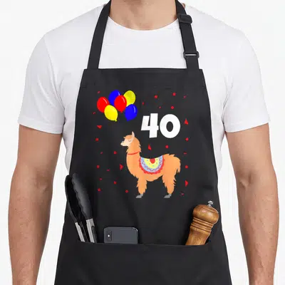 Tablier de cuisine noir avec illustration d'un lama orange tenant des ballons multicolores près du chiffre 40 blanc.