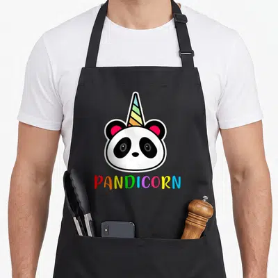 Tablier de cuisine noir avec un panda licorne coloré et le mot Pandicorn imprimé en lettres multicolores.