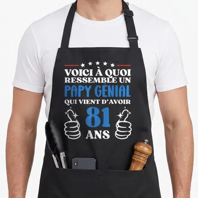 Tablier de cuisine noir avec inscription Voici à quoi ressemble un Papy Génial 81 ans et deux pouces levés blancs.