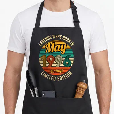 Tablier de cuisine noir avec motif circulaire vintage couleur et texte Légendes nées en mai 1996 Limited Edition.