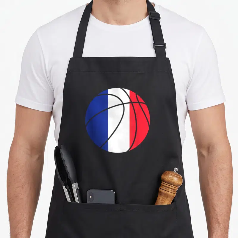 Tablier de cuisine noir avec un ballon de basket aux couleurs bleu blanc rouge du drapeau français.