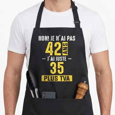 Tablier de cuisine noir avec inscription jaune et blanche Non je n'ai pas 42 ans plus TVA