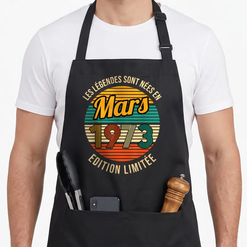 Tablier de cuisine noir avec motif circulaire vintage Les Légendes Sont Nées en Mars 1973 Edition Limitée