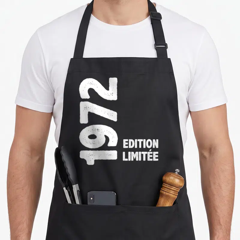 Tablier de cuisine noir avec le chiffre 54 vertical et le texte « Édition Limitée » en blanc.