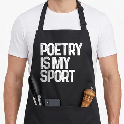 Tablier de cuisine noir avec l'inscription blanche Poetry Is My Sport en typographie épaisse et texturée.