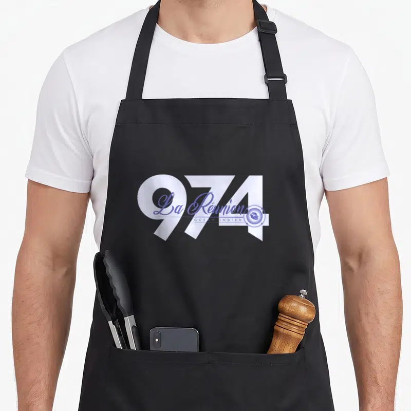 Tablier de cuisine noir avec le motif 974 La Réunion Océan Indien en blanc et bleu pastel.