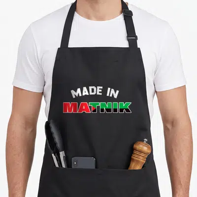Tablier de cuisine noir avec inscription « Made In Matnik » aux couleurs du drapeau martiniquais.