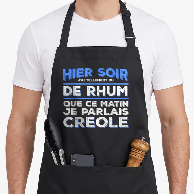 Tablier de cuisine noir avec inscription bleue et blanche Hier soir j'ai tellement bu de rhum que ce matin je parlais créole