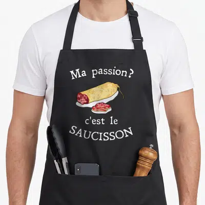 Tablier de cuisine noir avec illustration de saucisson tranché et texte blanc Ma passion c'est le saucisson