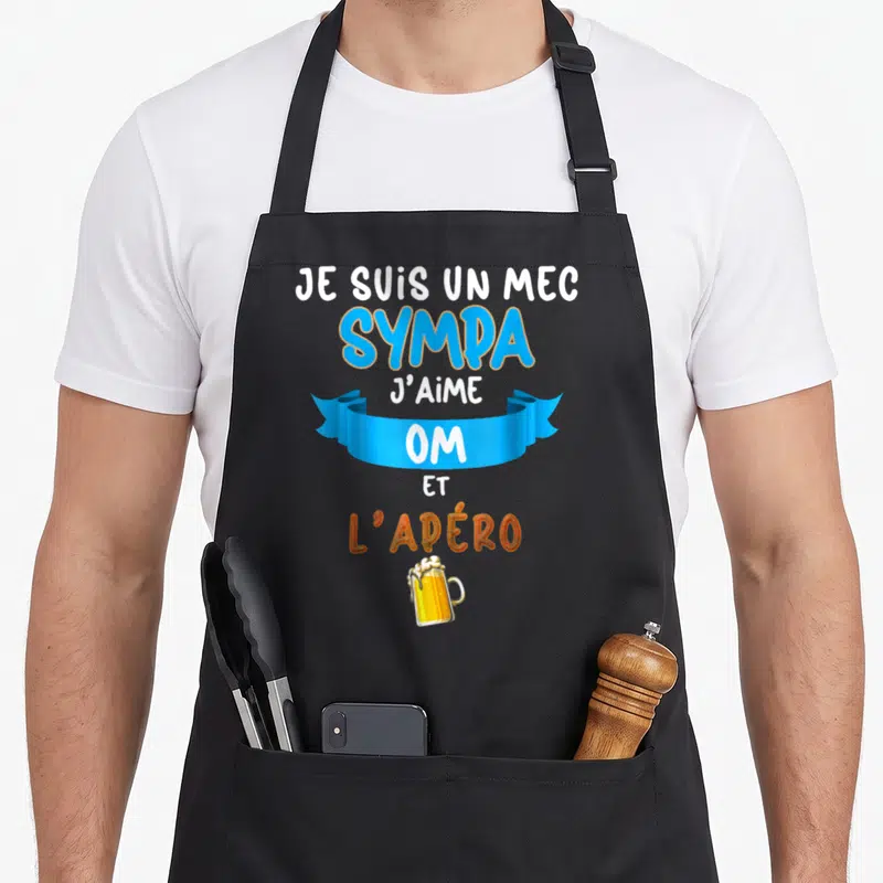 Tablier de cuisine noir avec texte Je suis un mec sympa OM et l'apéro ainsi qu'une illustration de verre de bière.