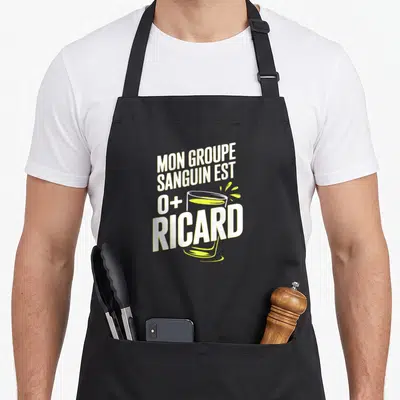 Tablier de cuisine noir avec inscription Mon groupe sanguin est O+ Ricard et illustration de verre jaune