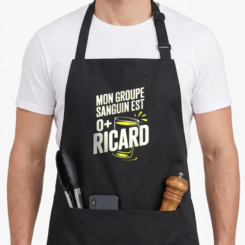 Tablier de cuisine noir avec inscription Mon groupe sanguin est O+ Ricard et illustration de verre jaune