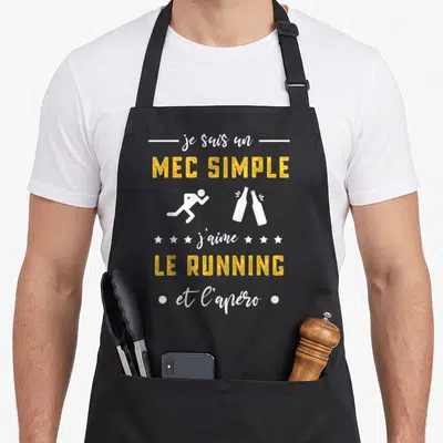 Tablier de cuisine noir avec texte jaune et blanc illustrant un coureur et deux bouteilles d'apéro.