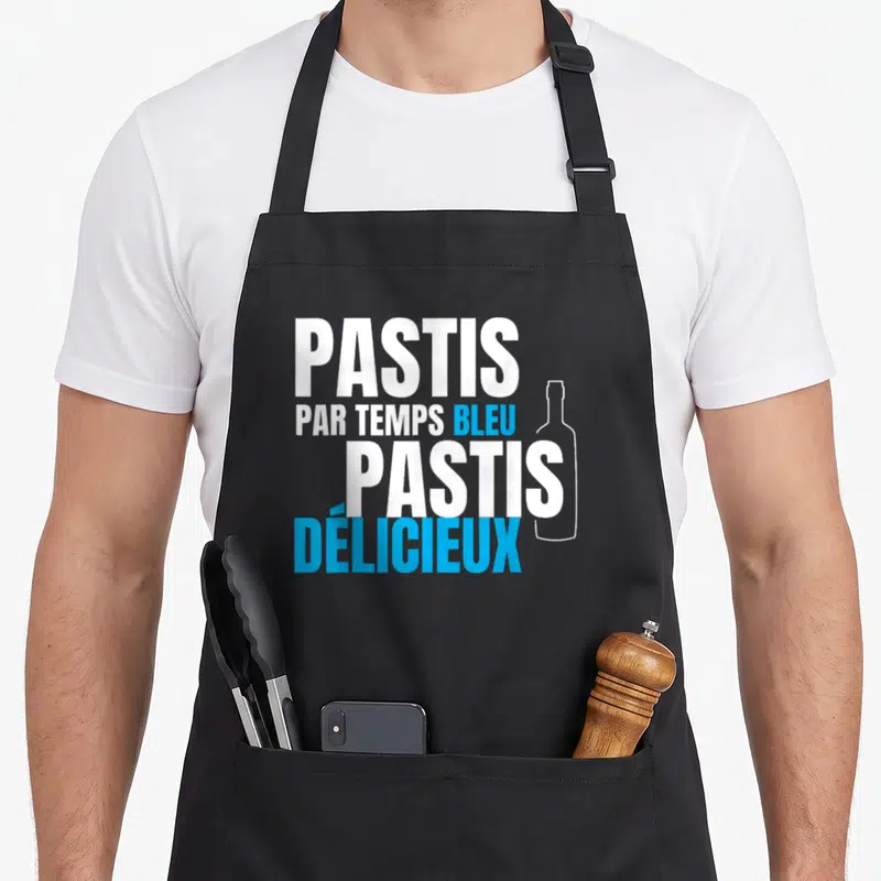 Tablier de cuisine noir avec inscription Par temps bleu pastis délicieux et silhouette de bouteille blanche.