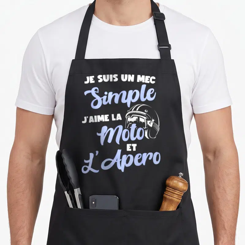 Tablier de cuisine noir avec texte blanc et bleu clair et illustration de casque de moto vintage.