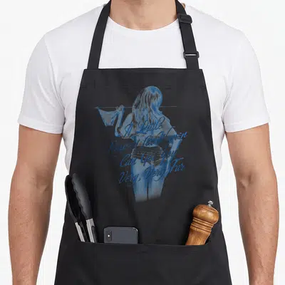 Tablier de cuisine noir avec silhouette féminine et texte A Little Respect for Women en bleu sur le dos.