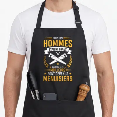 Tablier de cuisine noir avec inscription Tous les hommes étaient égaux mais seuls les meilleurs sont devenus menuisiers et deux scies croisées.