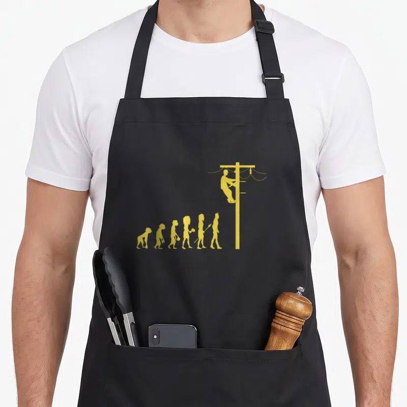 Tablier de cuisine noir avec silhouette jaune représentant l'évolution humaine jusqu'à un électricien en hauteur.