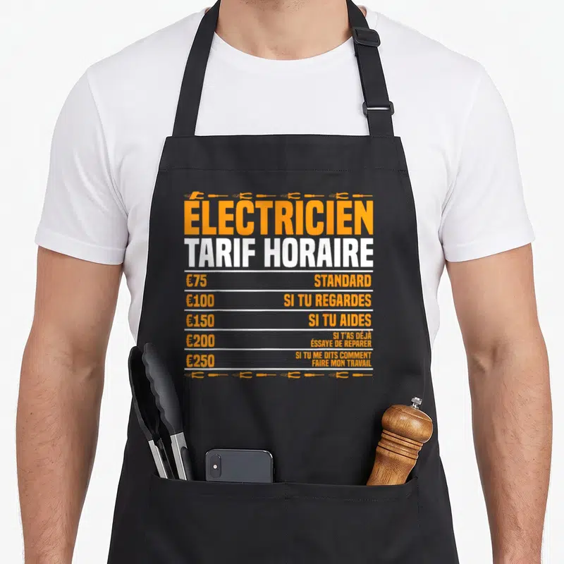 Tablier de cuisine noir avec tarif horaire electricien humoristique en orange et blanc illustré de tournevis.