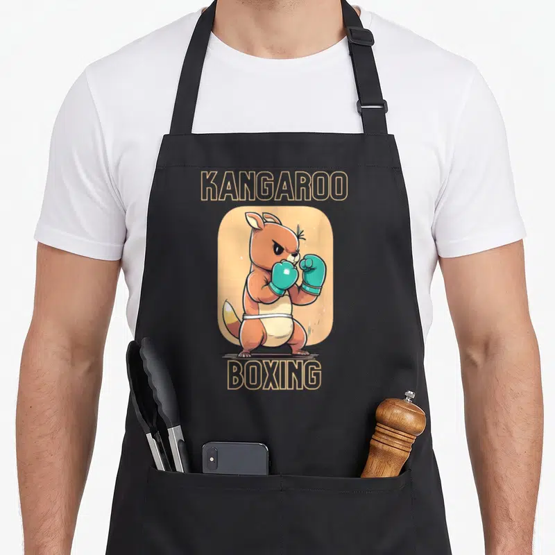 Tablier de cuisine noir avec kangourou marron portant des gants de boxe turquoise et le texte boxing en lettres capitales.