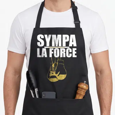 Tablier de cuisine noir avec inscription blanche Sympa la force et illustration de gants de boxe dorés en bas du motif imprimé.