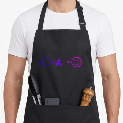 Tablier de cuisine noir avec un visage triste, un pratiquant d'aïkido et un sourire souriant en violet et rose.