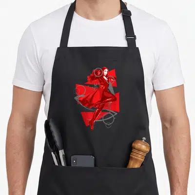 Tablier de cuisine noir avec illustration de Wanda Maximoff en tenue rouge et symboles magiques gris.