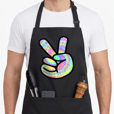 Tablier de cuisine noir avec un signe de la main arc-en-ciel paix enfants aux couleurs vives et au contour noir épais.