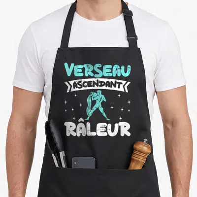 Tablier de cuisine noir avec motif Verseau Ascendant Râleur et illustration du signe astrologique en turquoise.