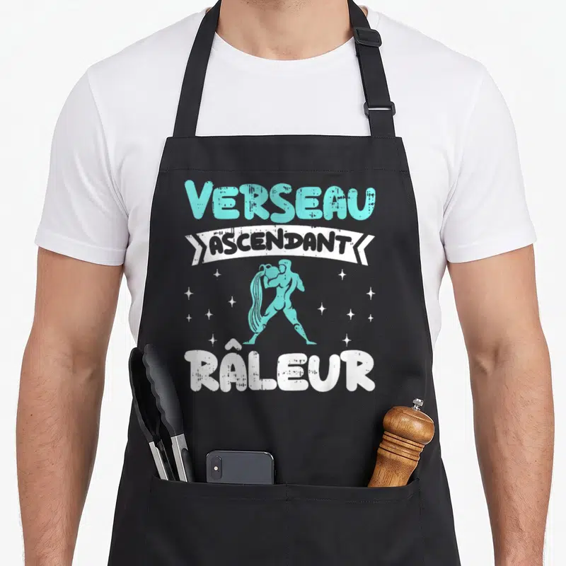Tablier de cuisine noir avec motif Verseau Ascendant Râleur et illustration du signe astrologique en turquoise.