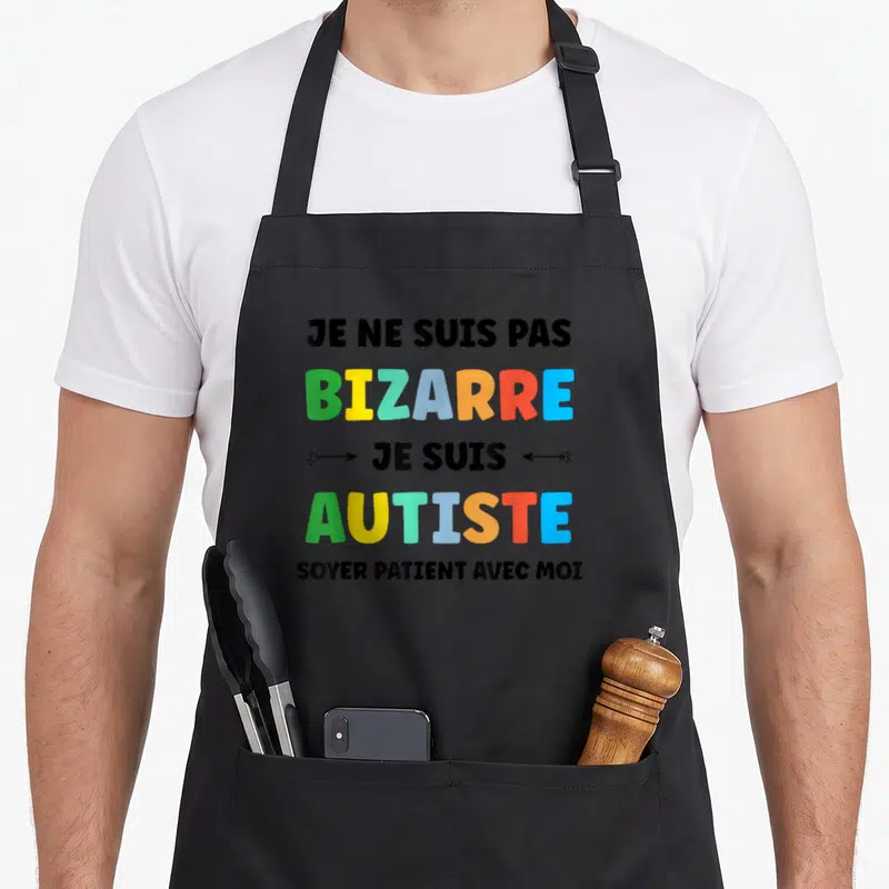 Tablier de cuisine noir avec texte multicolore Je ne suis pas bizarre je suis Autiste Soyer patient avec moi.