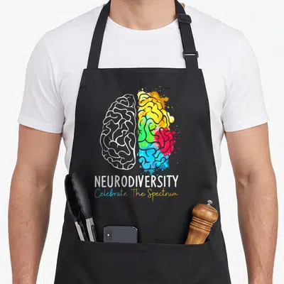 Tablier de cuisine noir avec illustration cerveau arc-en-ciel et texte Neurodiversity Celebrate The Spectrum