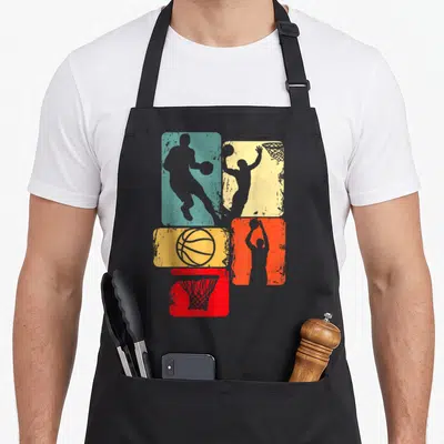 Tablier de cuisine noir avec silhouettes basketteur et panier sur fonds colorés vintage