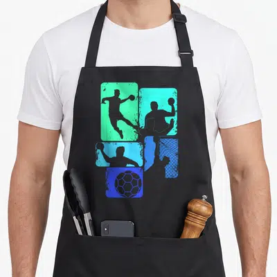 Tablier de cuisine noir avec silhouettes de joueurs de handball sur rectangles turquoise et bleu vif, motif sportif vintage.