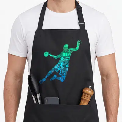 Tablier de cuisine noir avec silhouette de joueur de handball composée d'icônes sportives en dégradé bleu et vert.