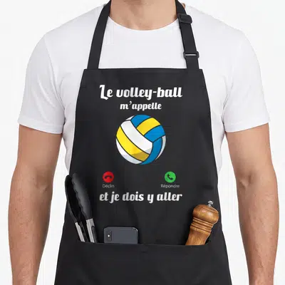 Tablier de cuisine noir avec une balle de volley jaune bleue et des icônes d'appel téléphonique.