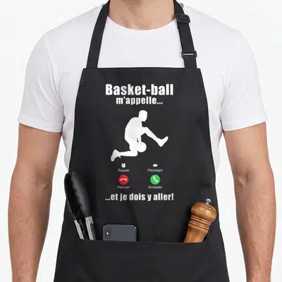 Tablier de cuisine noir avec silhouette blanche de joueur de basket et boutons d'appel téléphonique.