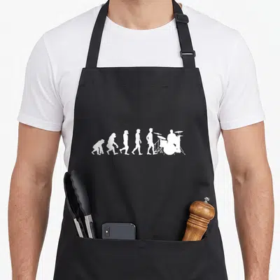 Tablier de cuisine noir avec silhouette blanche représentant l'évolution vers un musicien de batterie.