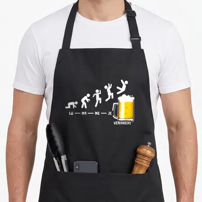 Tablier de cuisine noir avec illustration blanche et jaune montrant l'évolution des jours de la semaine vers une bière pour vendredi.
