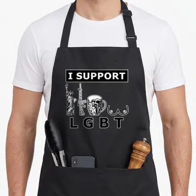 Tablier de cuisine noir avec inscription I SUPPORT LGBT et dessins Statue liberté, fusil, chope de bière et seins stylisés en blanc.