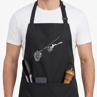 Tablier de cuisine noir avec une illustration blanche d'une main s'étirant vers un houblon détaillé.