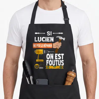 Tablier de cuisine noir avec illustration d'une perceuse, d'un marteau et du texte Si Lucien ne peut le réparer on est foutus.