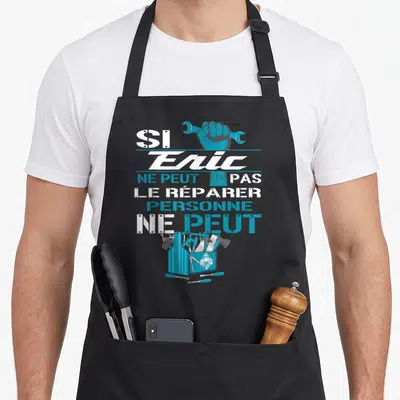 Tablier de cuisine noir avec inscription Si Eric ne peut pas le réparer personne ne peut et boîte à outils bleue.