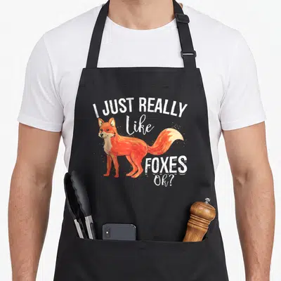 Tablier de cuisine noir avec illustration de renard roux et texte blanc I Just Really Like Foxes Ok