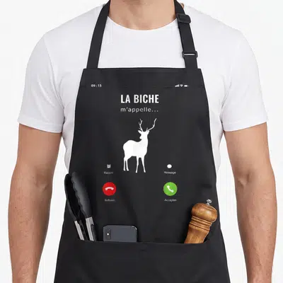 Tablier de cuisine noir avec une illustration téléphone affichant un cerf blanc et des boutons rouges et verts.