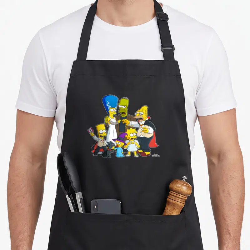 Tablier de cuisine noir avec les Simpson déguisés en famille de monstres pour Halloween.