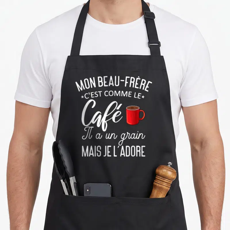 Tablier de cuisine noir avec texte blanc et illustration de tasse de café rouge