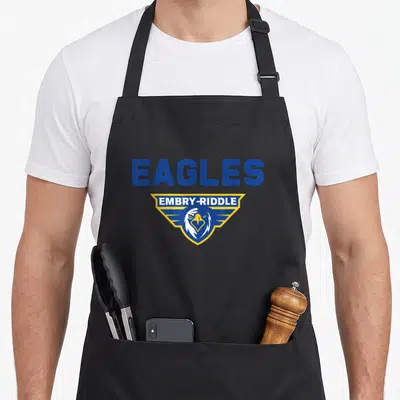 Tablier de cuisine noir avec le logo Embry-Riddle Eagles représentant un aigle bleu et jaune au centre.